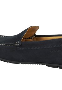 Navyblaue Wildleder-Lederschuhe im Mokassin-Stil mit kontrastierenden weißen Nähten und Gummisohle. Innen mit braunem Leder ausgekleidet für zusätzlichen Komfort.