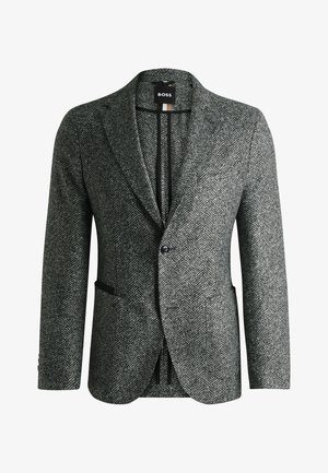 Blazer grigio a motivo herringbone con rever a punta, chiusura con un solo bottone e tasche. Tessuto testurizzato con foderatura liscia. Etichetta del marchio visibile all'interno.