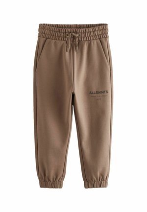 Hnedé tepláky vyrobené z mäkkého materiálu s elastickým pásom a šnúrkou na stiahnutie. Obsahujú bočné vrecká a logo 'ALLSAINTS' na stehne.
