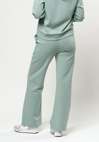 U.S. Polo Assn. GITA  - Treniņtērpa apakšdaļas - green milliue