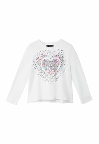 White long-sleeve shirt featuring a colorful sparkly heart design made of multicolored dots and glitter, with a rounded neckline.