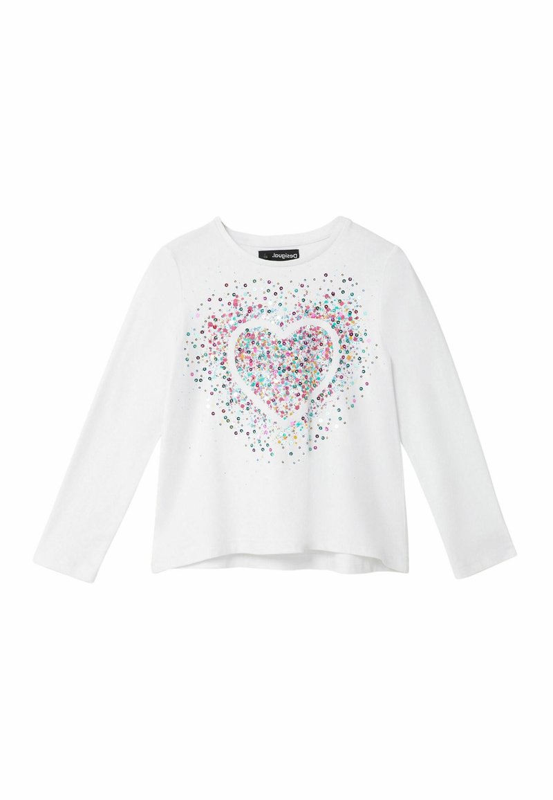 White long-sleeve shirt featuring a colorful sparkly heart design made of multicolored dots and glitter, with a rounded neckline.