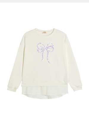 Kremowy sweatshirt z okrągłym dekoltem i długimi rękawami, z błyszczącym wzorem kokardy na środku i warstwowym dołem.