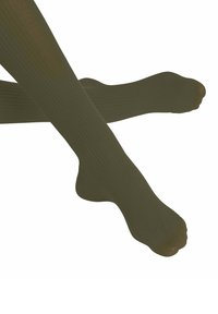 Collant verde oliva a costine con una texture liscia e punta rinforzata. Il design presenta una vestibilità aderente che segue la forma della gamba.