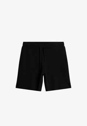 Pantaloni corti neri realizzati in morbido tessuto con vita elastica e cordino. Presentano due tasche laterali e una vestibilità comoda con aperture all'orlo.