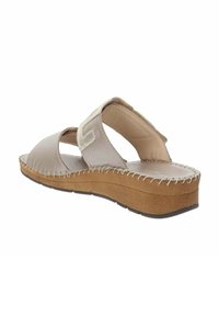 Sandali beige e grigi con suola in sughero, caratterizzati da due cinturini regolabili e cuciture decorative lungo i bordi per un tocco di eleganza.