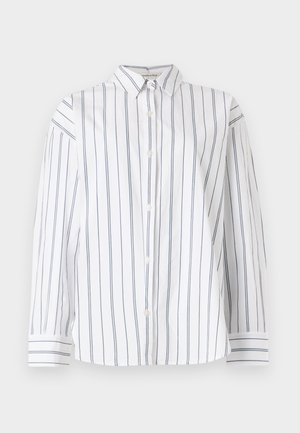 White cotton button-up shirt with vertical navy stripes, a classic collar, and long sleeves featuring striped cuffs. Soft texture.