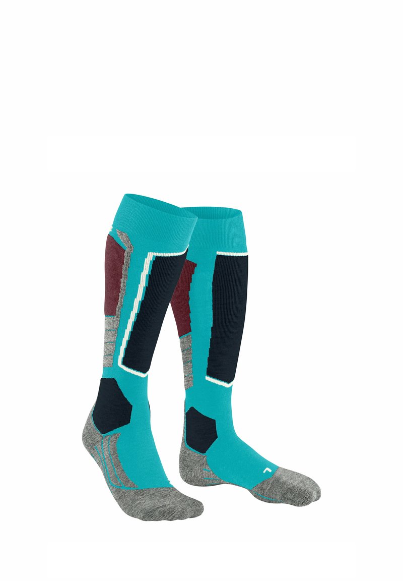 Chaussettes montantes en teal, gris, marine foncé et bordeaux, présentant des motifs géométriques et des panneaux de textures variées pour un confort accru.