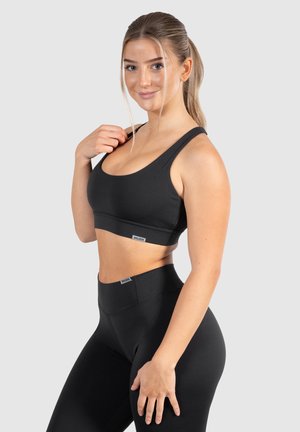 SPORT BH ADVANCE PRO - Brassières de sport à maintien léger - schwarz