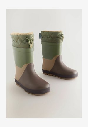 Vízálló csizmák olajzöld, barna és bézs színben. Steppelt felső résszel, struktúrált tapadós talppal, és állítható záródással, prémes béléssel.