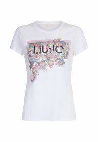 T-shirt bianco in cotone con maniche corte, caratterizzato da un design floreale e paisley colorato, centrato con "LU:10" in lettere nere in grassetto.