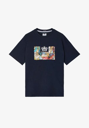 Navy blue short-sleeve t-shirt with a colorful sneaker collage and white crown graphic centered on the chest.