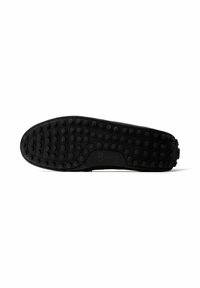Μαύρη σόλα παπουτσιού με στρογγυλά ελαστικά καρφιά τοποθετημένα σε μοτίβα για καλύτερη πρόσφυση, ορατές ενδείξεις μεγέθους σε λευκό φόντο.