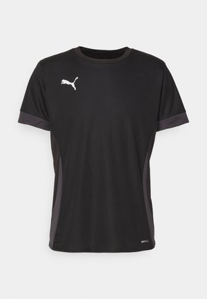 Černé sportovní tričko s krátkým rukávem, se bílým logem Puma na hrudi a texturovanými šedými bočními panely. Vyrobeno z prodyšného materiálu.