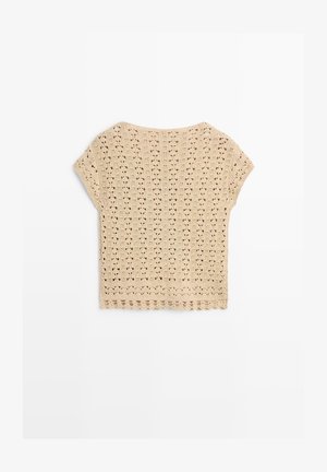Top beige a manica corta lavorato a uncinetto con orlo smerlato e motivo traforato, disteso su sfondo bianco.