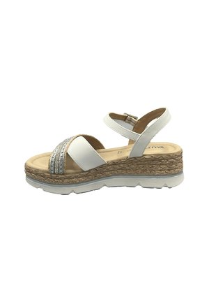 Sandalo con zeppa bianca con cinturini in perline argentate, fibbia regolabile alla caviglia e suola in stile espadrille testurizzata. Materiale superiore liscio.