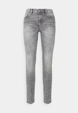 Damskie szare jeansy slim-fit w stylu acid-wash z guzikiem z przodu, zapięciem na zamek i stylem pięciu kieszeni.