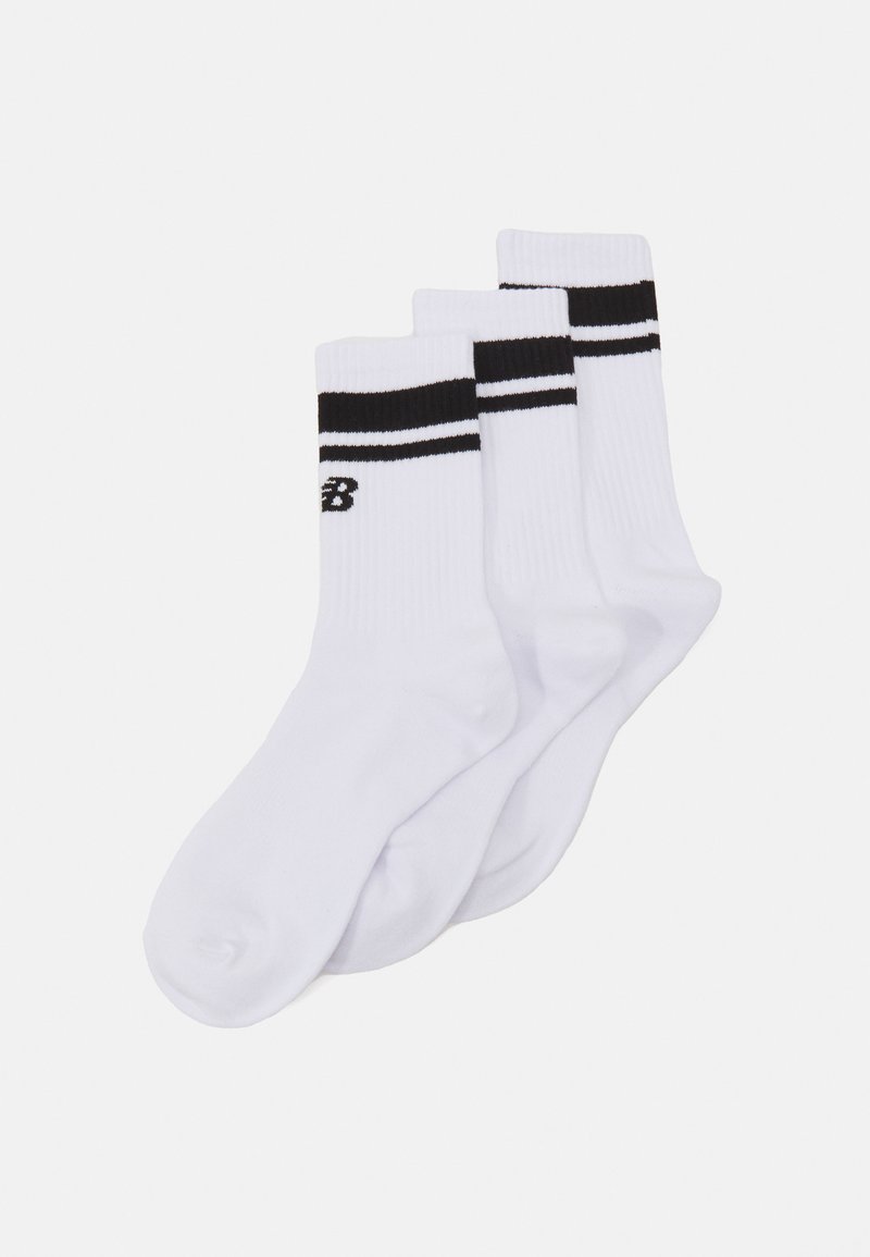 Calcetines de algodón blancos con rayas horizontales negras en la parte superior y logo "N". Textura suave, de longitud hasta el tobillo, vendidos en paquete de tres.