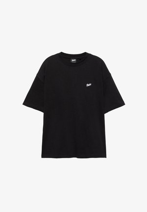 Black cotton t-shirt with short sleeves and a round neckline. Features a small white logo on the left chest area. Casual, loose fit.
