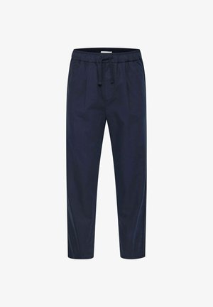 Tmavomodré ležérne nohavice s elastickým pásom a šnúrkou, priamy strih nohavíc a bočné vrecká.