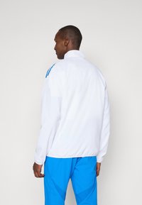 adidas Performance REAL biały