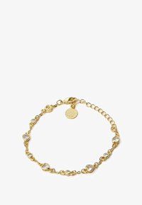 Seleccionado, gold-coloured