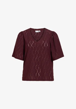 Blouse bordeaux à manches courtes avec manches bouffantes, encolure en V et motif géométrique en dentelle sur tout le tissu.