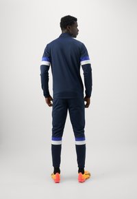 Puma INDIVIDUALRISE SET niebieski