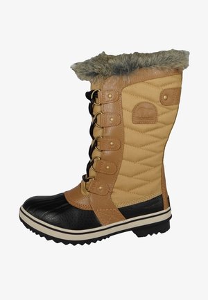 Botte d'hiver imperméable beige et noire avec un design matelassé, sommet en fausse fourrure, bout rond, laçage à l'avant et semelle en caoutchouc texturée.