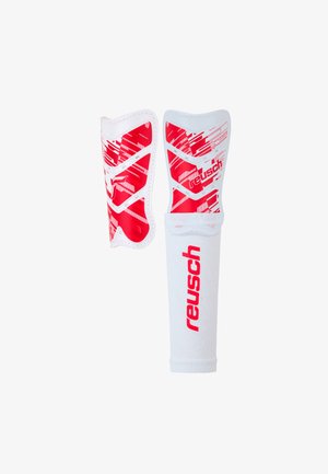 Reusch white shin guards with red accents, featuring a textured surface and protective design, include a soft fabric support sleeve.