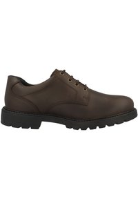 Scarpa in pelle marrone con lacci, dalla finitura liscia, punta rotonda e suola in gomma nera resistente con scanalature profonde per una buona aderenza.