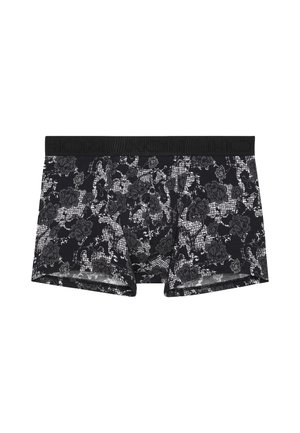 Boxer brief neri con un motivo in pizzo floreale bianco. Presentano un elastico nero solido con logo impresso. Tessuto morbido e elastico.