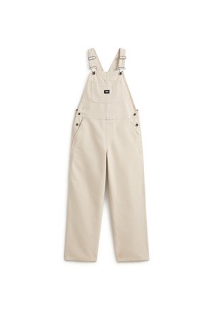 Beige Baumwoll-Overalls mit verstellbaren Schultergurten, Fronttasche auf der Brust mit Logo-Aufnäher, Seitenknöpfen und geradem Bein.