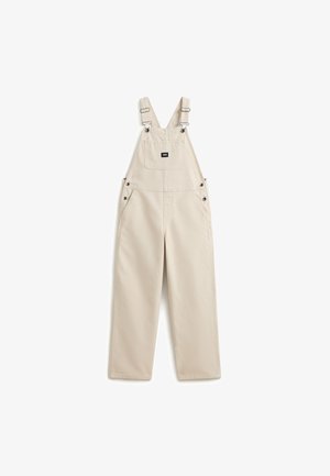 Salopette beige in cotone con spalline regolabili, tasca frontale sul petto con patch logo, bottoni laterali e design a gamba dritta.