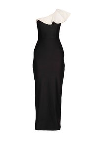 Black fitted dress with a single white ruffled shoulder detail; smooth texture, long length, and sleek silhouette.