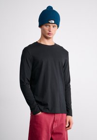 The North Face UNISEX granatowy