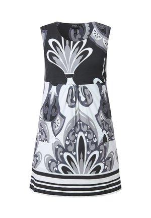 Ærmeløs sort og hvid mønstret kjole med store abstrakte blomsterdesigns og forlommer, med vandrette striber ved kanten.