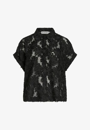 Zwarte blouse met korte mouwen, gebloemd kanten patroon, doorschijnende stof en een spitse kraag met het label "ROUGE EDIT".
