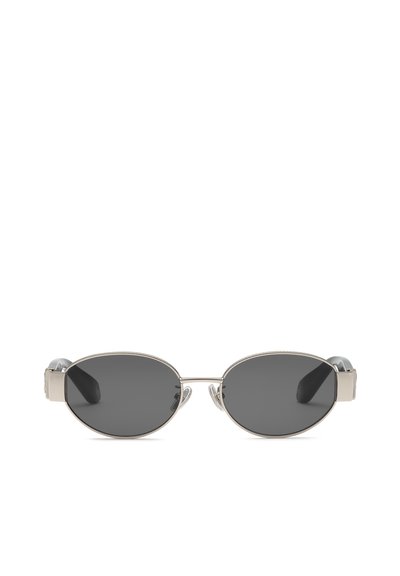 Lunettes de soleil ovales à verres teintés foncés, monture métallique fine argentée et branches noires, présentées sur fond blanc.