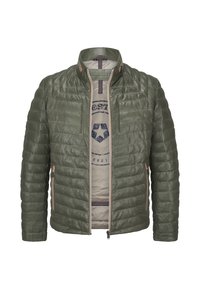 Olivgrüne gestepptte Jacke mit Stehkragen, Reißverschluss vorne und zwei Seitentaschen. Mit beiger Innenfütterung und dezentem Branding im Inneren.