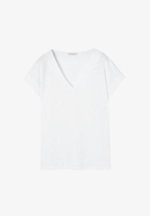 Fehér, rövid ujjú, V nyakú póló puha anyagból. Laza fazon, egyenes szegéllyel. Minimalista dizájn, minta vagy díszítés nélkül.