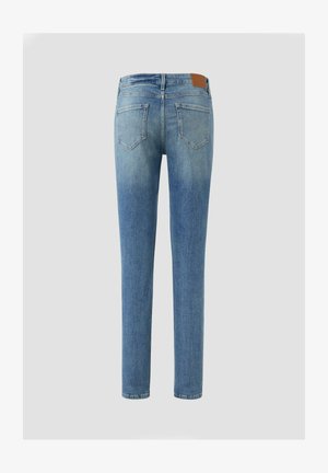 Light blue denim jeans with a slim fit, mid-rise waist, back pockets, and contrast stitching. Features a brown leather patch on the waistband.