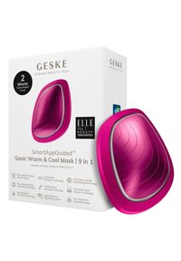 Masque facial Sonic rose avec un design incurvé et une surface texturée. La boîte présente le logo et des points forts technologiques, soulignant sa fonctionnalité 9-en-1.