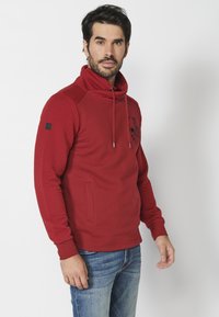 Koroshi Melegítőfelső - rojo red