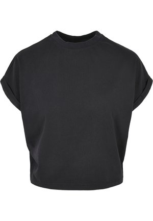 Svart topp med kort erme laget av bomull, med rullet erme og rund hals. Glatt tekstur og minimalistisk design.