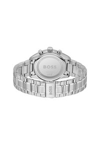 Stainless steel wristwatch with a silver bracelet, round case, chronograph functions, and engraved logo on the back. Water-resistant to 5 ATM.