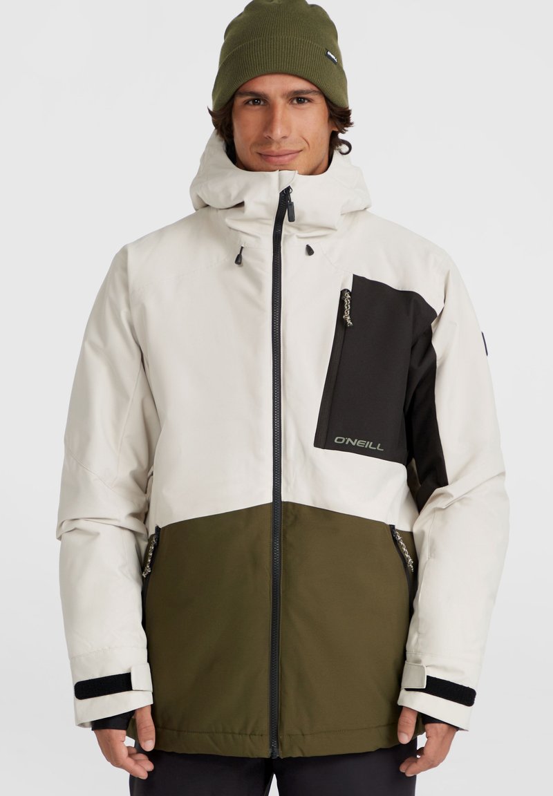 Veste d'hiver pour hommes avec une partie supérieure blanche, une partie inférieure vert olive et des accents noirs. Inclut une poche poitrine zippée et des poignets ajustables.