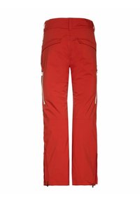 Pantalons de ski imperméables rouges avec des zips sur les poches, une taille plate et une texture lisse, conçus pour les activités de plein air.