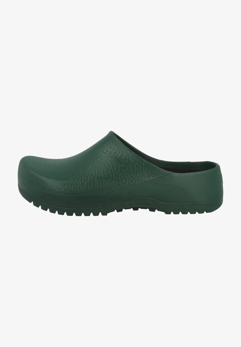 Green rubber clogs with a textured upper, a rounded toe, and a thick sole featuring tread patterns for grip. Open back design.