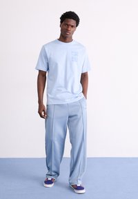 Ellesse TROPICOSA TEE - Marškinėliai su spaudiniu - light blue